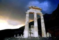 Delphi Tour : The Tholos at base of Mount Parnassus